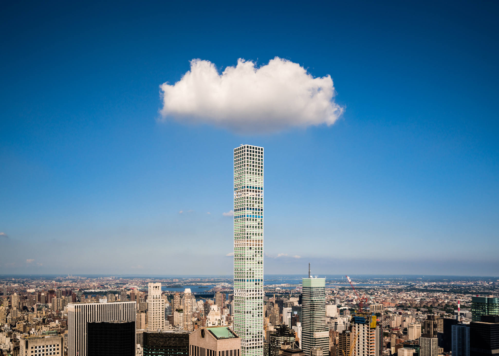 A cloud hangs over 432 Park Ave, New York City.